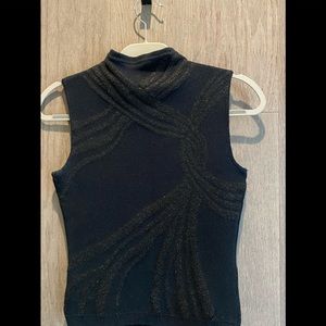 Elegant sleeveless mock sweater